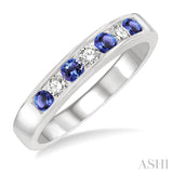 1/5 Ctw Channel Set Round Cut Diamond and 2.5 MM Round Cut Tanzanite Band in 14K White Gold