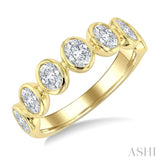 1 1/4 Ctw 7 Stone Bezel Set Oval Cut Diamond Fashion Band in 14K Yellow Gold