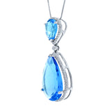 0.35ct Diamond & 17.65ct Blue Topaz 14k White Gold Pendant