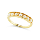 14K yellow gold with a row of white pearls. 