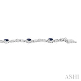 4X3 MM Pear Cut Sapphire and 1/20 Ctw Round Cut Diamond Precious Fashion Bracelet in 10K White Gold