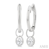 1/3 Ctw Bezel Set Oval Cut Diamond Huggie Earrings in 14K White Gold