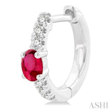 1/10 ctw Petite 4X3MM Oval Cut Ruby and Round Cut Diamond Fashion Huggies in 10K White Gold